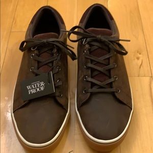 New UGG men’s water proof leather sneaker.